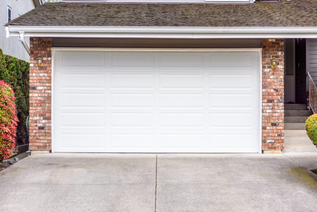 White garage door on a modern home